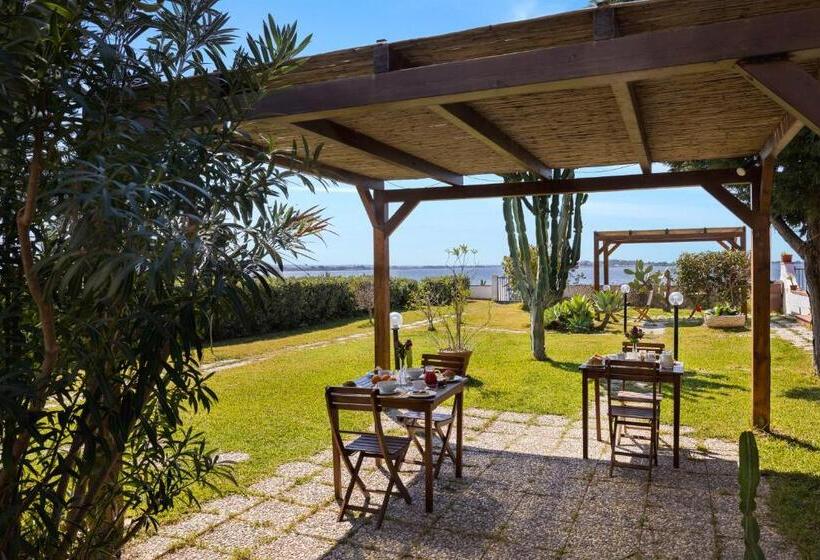 Отель Laguna Dei Fenici