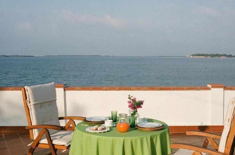 Отель Laguna Dei Fenici