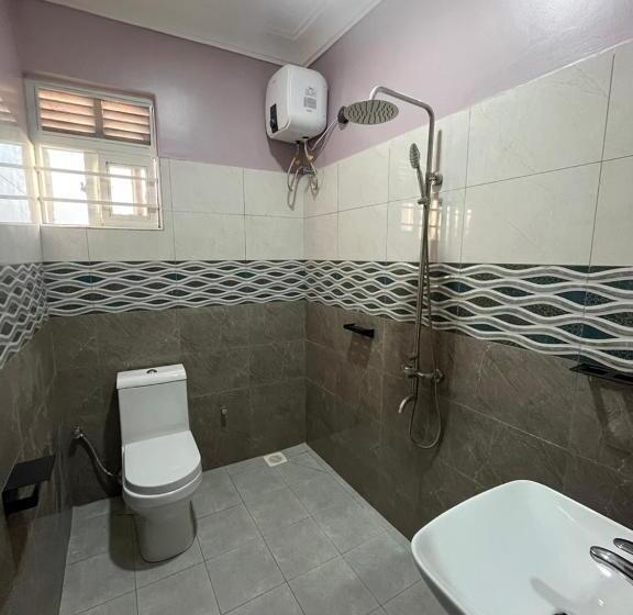 تختخواب و صبحانه Ronald Virtue Apartments