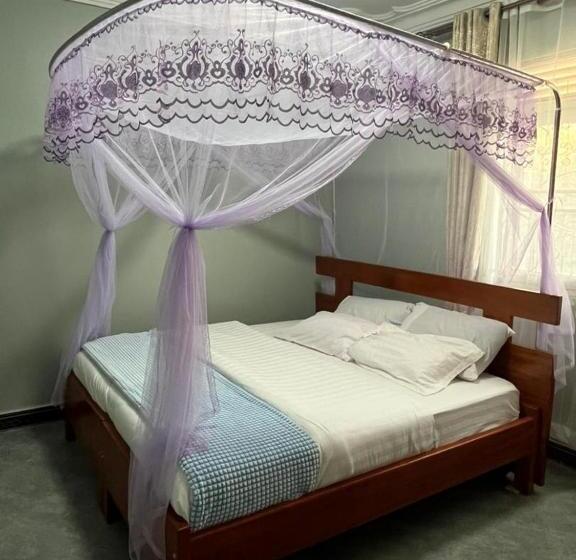 تختخواب و صبحانه Ronald Virtue Apartments