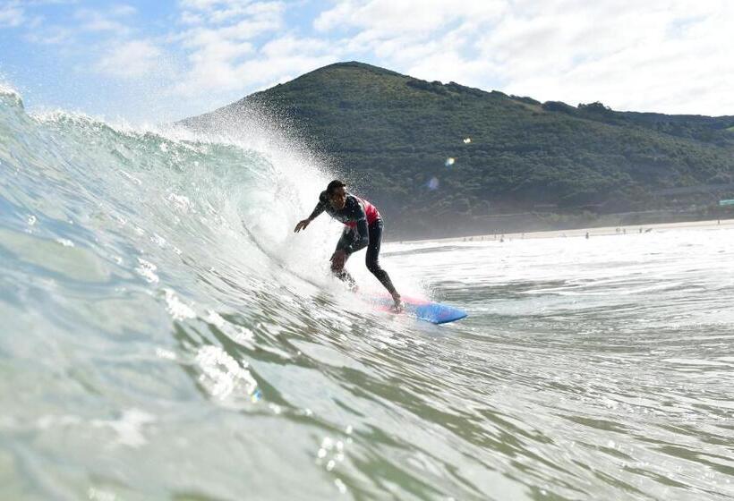 پانسیون Escuela De Surf Waves Sound   Alojamiento Compartido