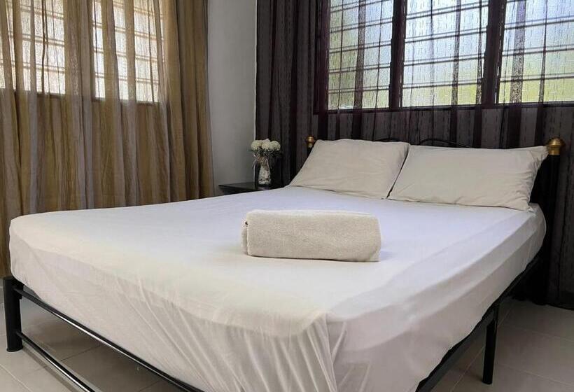 Отель Oyo Home 90692 Tok Babah Village Homestay