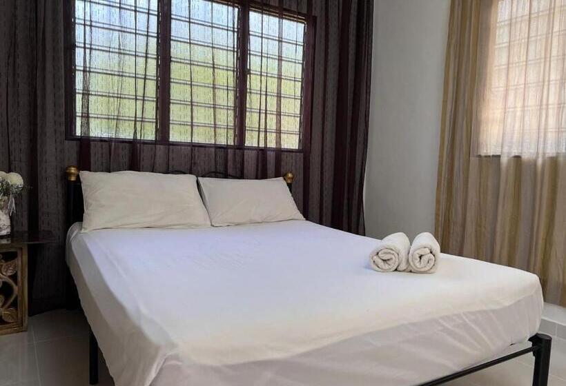 Отель Oyo Home 90692 Tok Babah Village Homestay