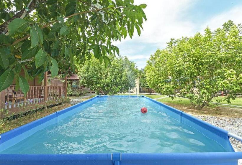 Отель Oyo Home 90692 Tok Babah Village Homestay