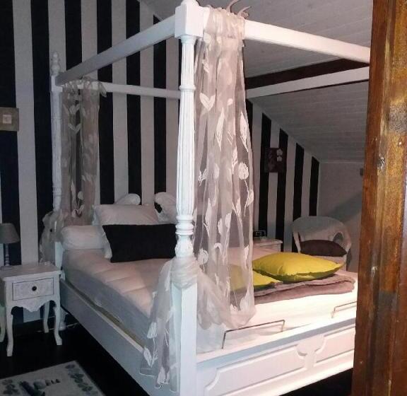 مبيت وإفطار Chez Les Dom’s