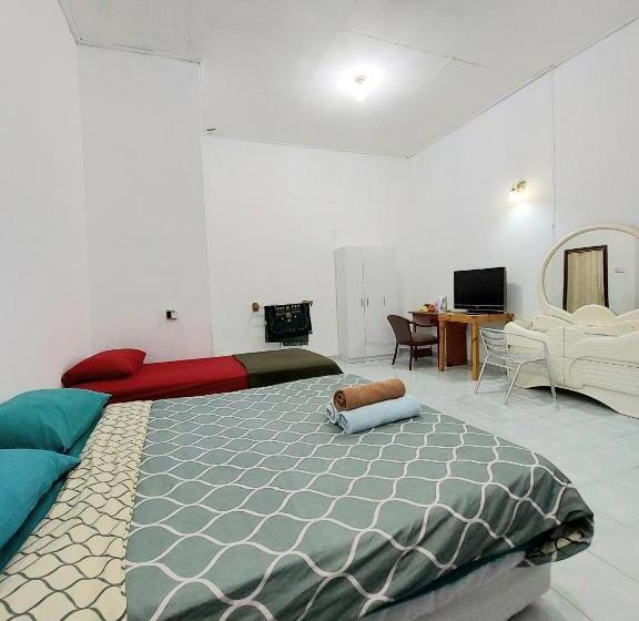 بنسيون Rumah Rehat Qnm Holidays