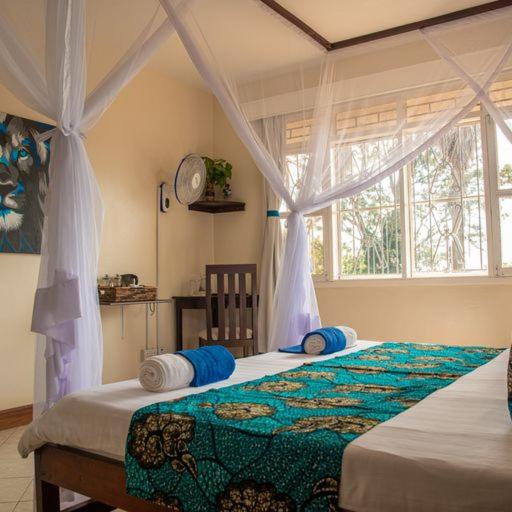 تختخواب و صبحانه Karibu Entebbe