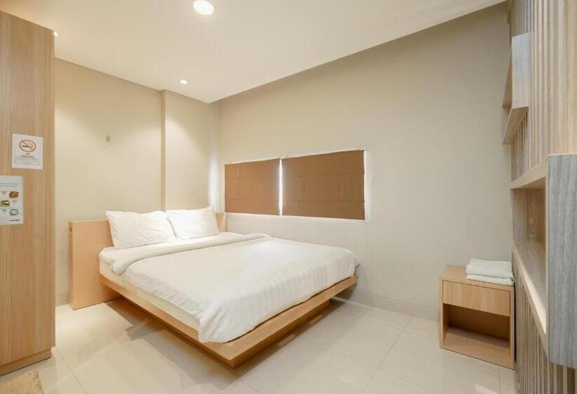 Отель Green Apple Residence Near Sarinah Mitra Reddoorz
