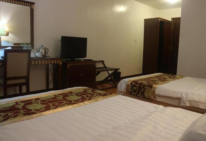 فندق Beach Garden