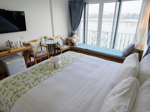 호텔 โมเมนต์ แอ๊ท ริมโขง