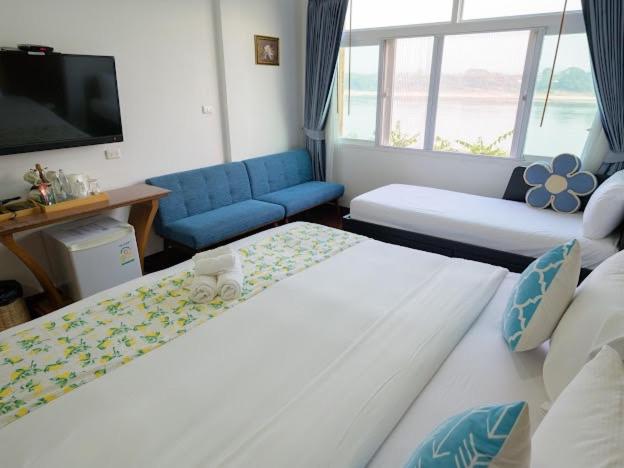 호텔 โมเมนต์ แอ๊ท ริมโขง