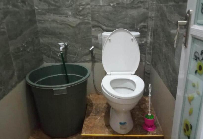 Отель Oyo 93866 Neva Guest House Syariah