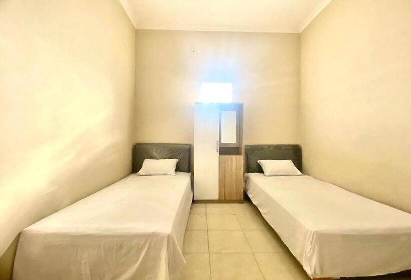 Отель Oyo 93838 Delia Inn Syariah