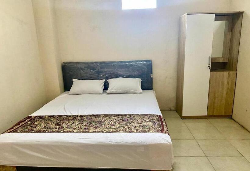 Отель Oyo 93838 Delia Inn Syariah