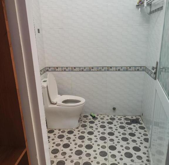 تختخواب و صبحانه Nhà Nghỉ Phú Quý