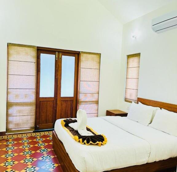 펜션 Tarang Holiday Homes