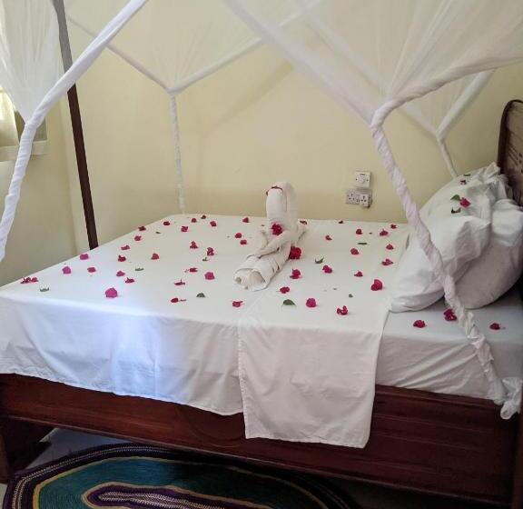 צימר Kua Garden Cottage