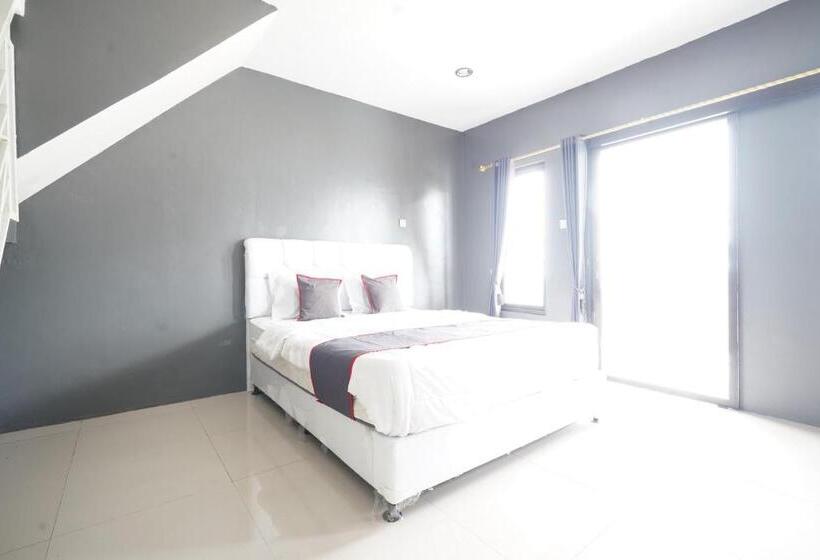 Отель Collection O 93732 Villa Opung