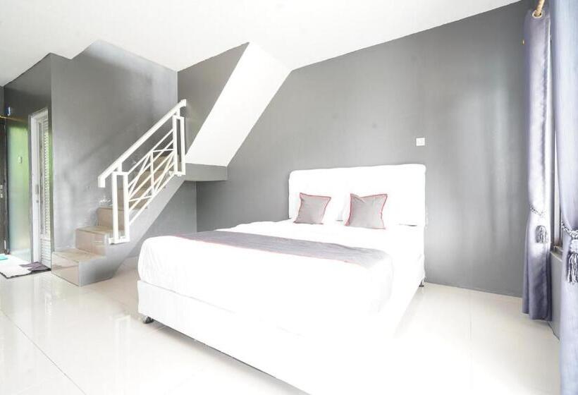 Отель Collection O 93732 Villa Opung