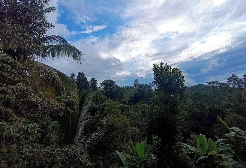 בית מלון כפרי Artomoro Bali