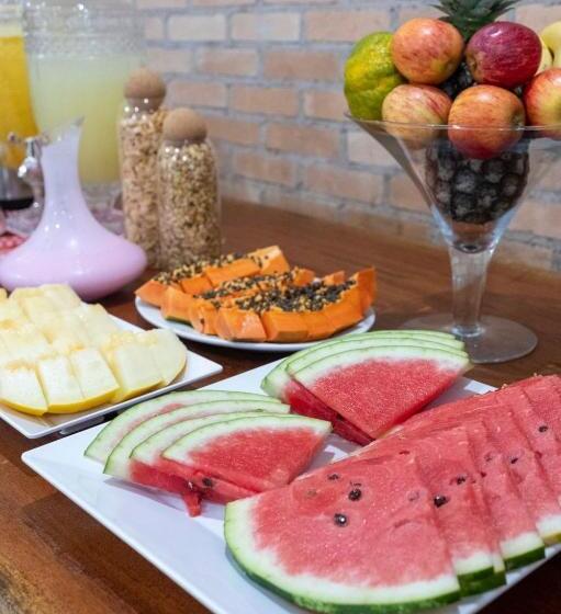 Отель Vila Das Palmeiras