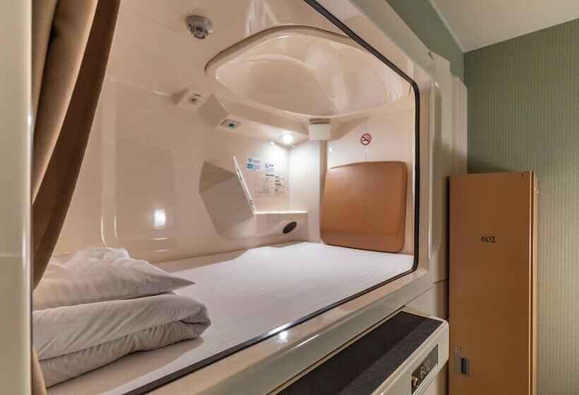 Отель Asahi Sauna Capsule Inn Hirosaki