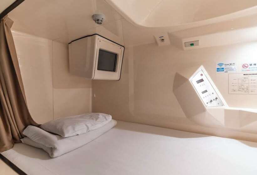 Отель Asahi Sauna Capsule Inn Hirosaki