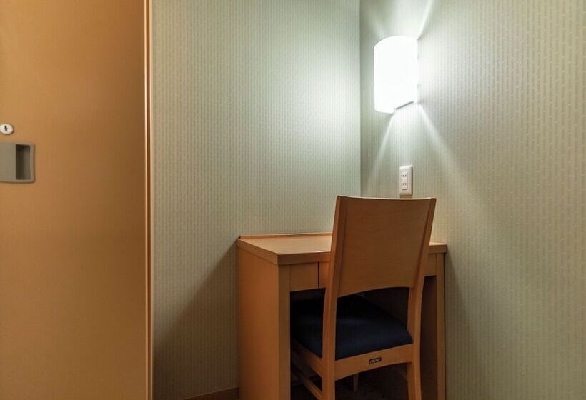 Отель Asahi Sauna Capsule Inn Hirosaki