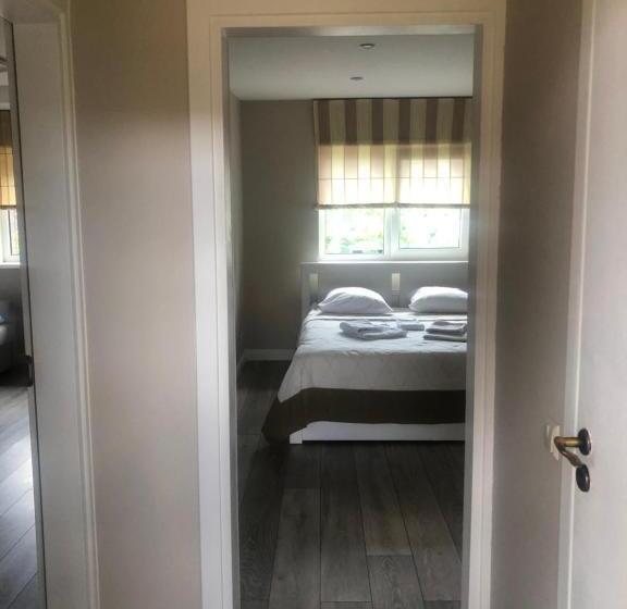 تختخواب و صبحانه Ošupio Tako Apartamentai