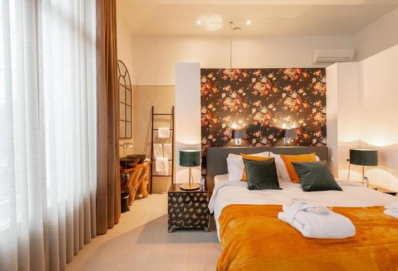 Отель Bossche Suites Stationsweg