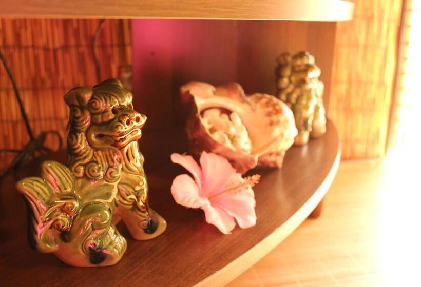 فندق صغير Okinawa Minshuku Kariyushi
