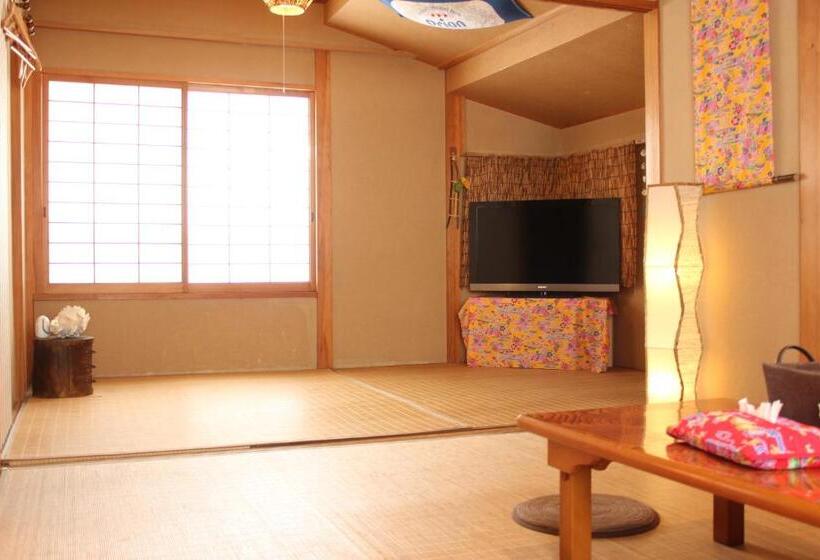 فندق صغير Okinawa Minshuku Kariyushi