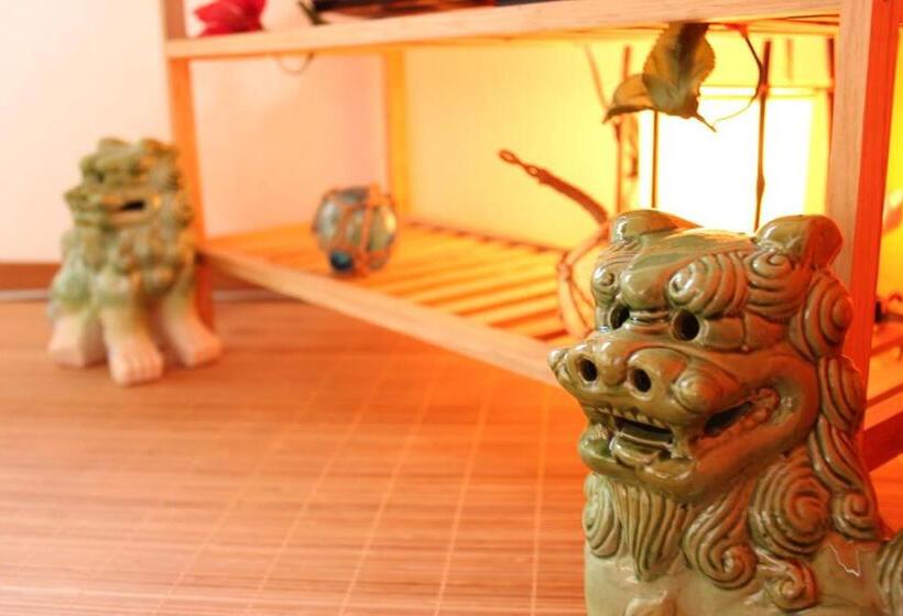 فندق صغير Okinawa Minshuku Kariyushi