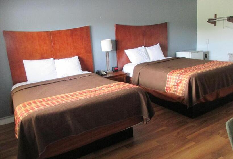 فندق على الطريق Travel Inn & Suites