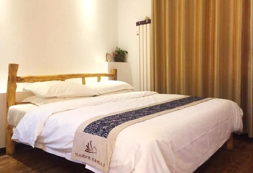 فندق صغير Dunhuang Silk Yododo Inn