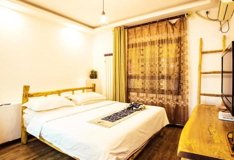 فندق صغير Dunhuang Silk Yododo Inn