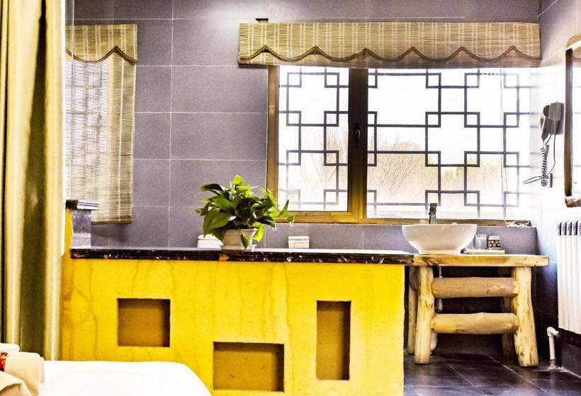 فندق صغير Dunhuang Silk Yododo Inn