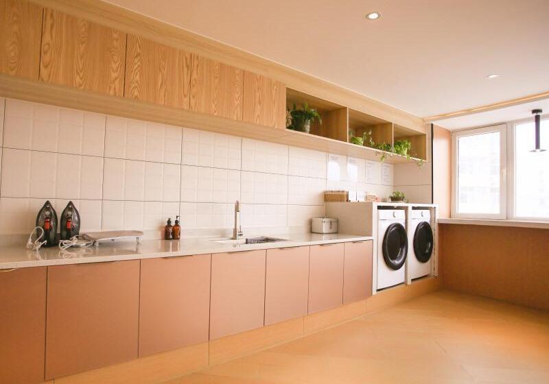 בית מלון כפרי Greentree Inn Shandong North Weihai Station North International Bathing Beach Business