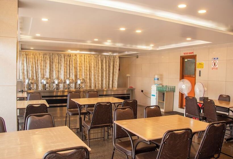 Отель Om International