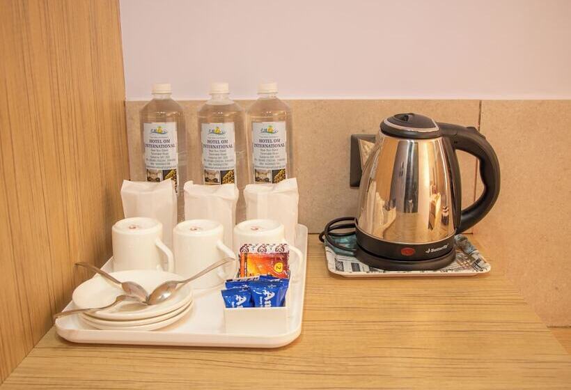 Отель Om International