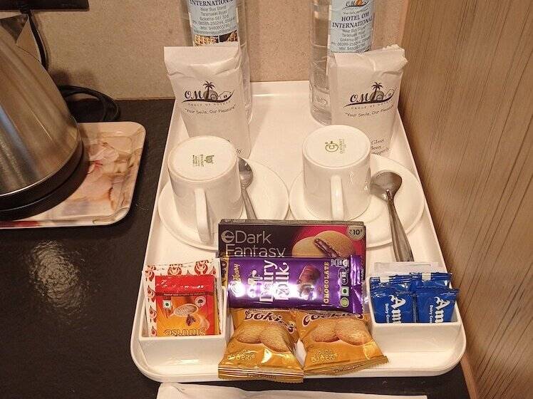 Отель Om International