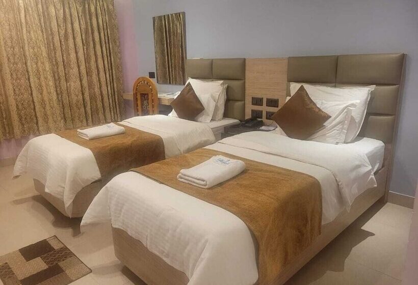 Отель Om International