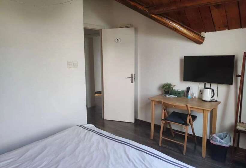 פנסיון Shanghai Hua Xi Shui Xie Guesthouse