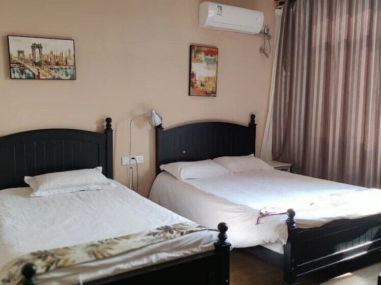 פנסיון Shanghai Hua Xi Shui Xie Guesthouse