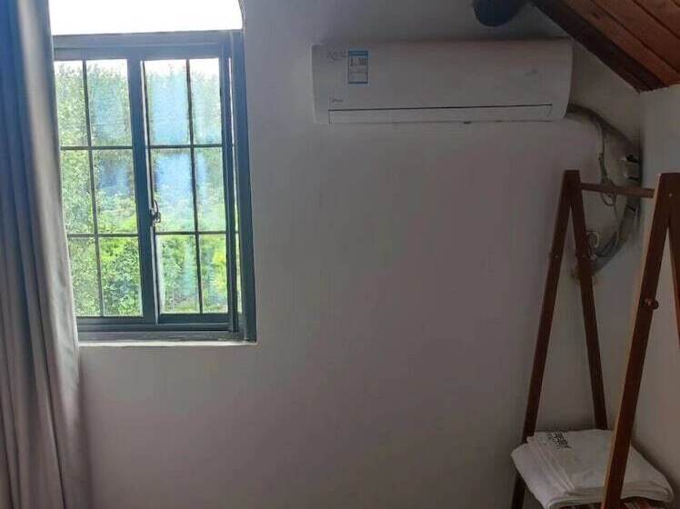 פנסיון Shanghai Hua Xi Shui Xie Guesthouse