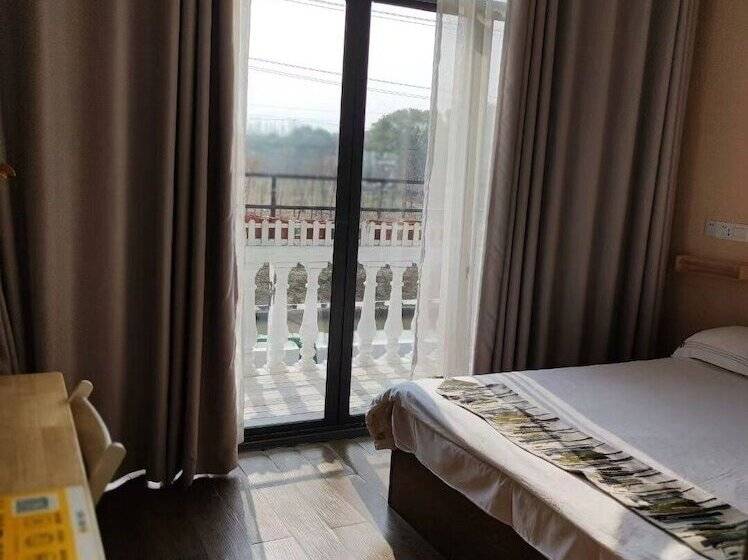 پانسیون Shanghai Hua Xi Shui Xie Guesthouse