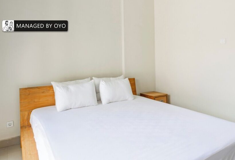 Отель Capital O The Kumpi