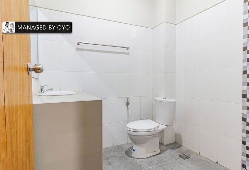 Отель Capital O The Kumpi