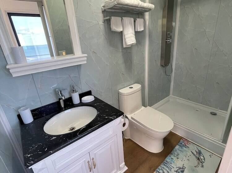 בית מלון כפרי Great Cistern Beach Village