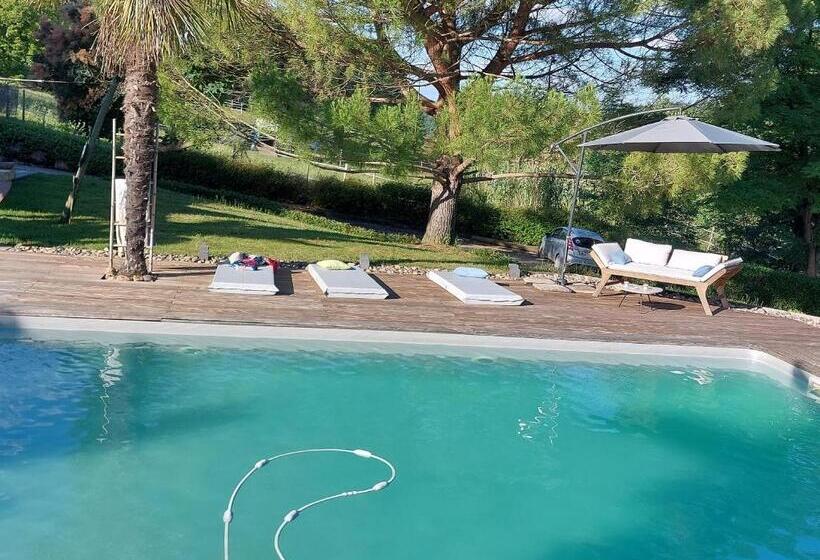 مبيت وإفطار Cocon De Verdure Avec Piscine Chambre Lit King Size 2m